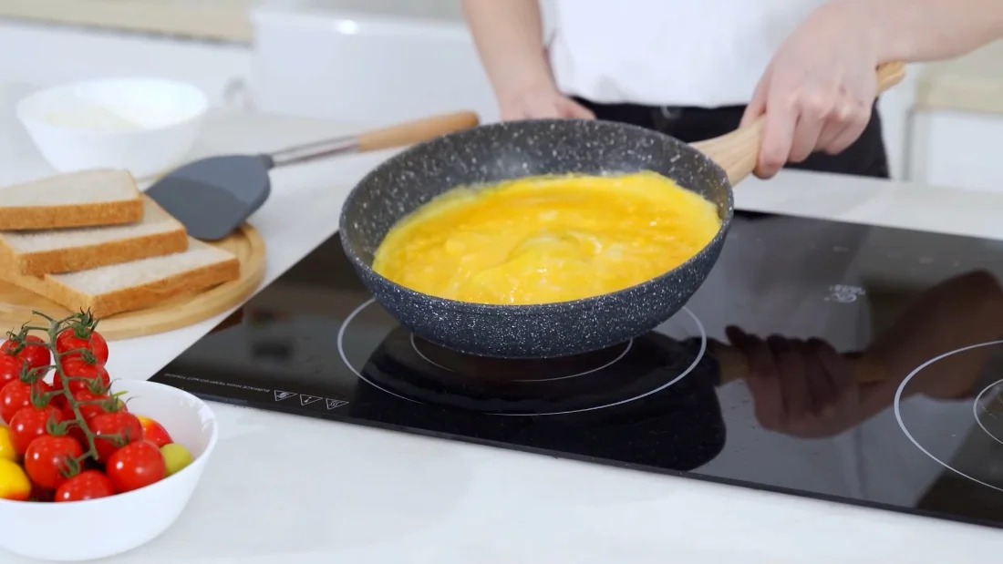 Eggs on a whisper of oil: the release granite coating is built for.